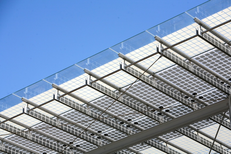 The Academy's awning has photovoltaic cells installed at the top to help power the building with solar energy